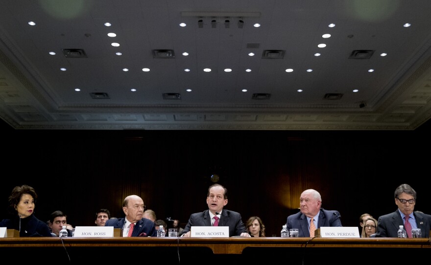 From left: Transportation Secretary Elaine Chao, Commerce Secretary Wilbur Ross, Labor Secretary Alex Acosta, Agriculture Secretary Sonny Perdue and Energy Secretary Rick Perry appear before a Senate committee Wednesday.