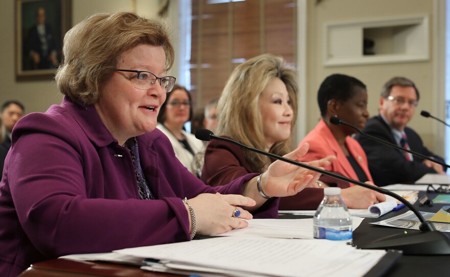 Victoria Lipnic (left), acting chair of the Equal Employment Opportunity Commission, testifies before the House Administration Committee during a hearing on preventing sexual harassment in Congress in December 2017.