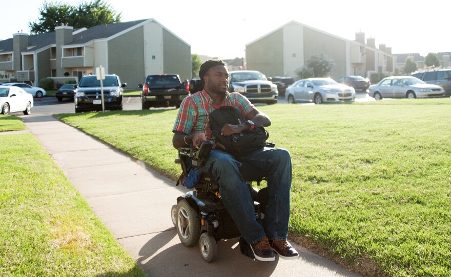After a long day, Emeka arrives home to the apartment in South Tulsa that he shares with his father.