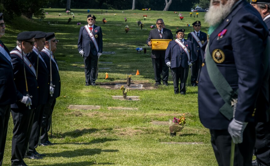 The knights of Columbus act as pallbearers for the tiny coffins of abandoned children at the Garden of Innocence, San Diego, June 17, 2023.<br/>