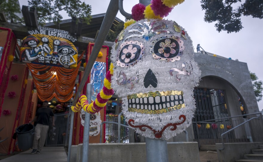Brightly colored papier-mâché calaveras (skulls) decorate the Sherman Heights Community Center for Día de Muertos on Oct. 15, 2024.