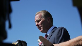 City Councilman Kevin Faulconer speaks with reporters after officially announcing his intention to run for mayor of San Diego, Sept. 4, 2013. 