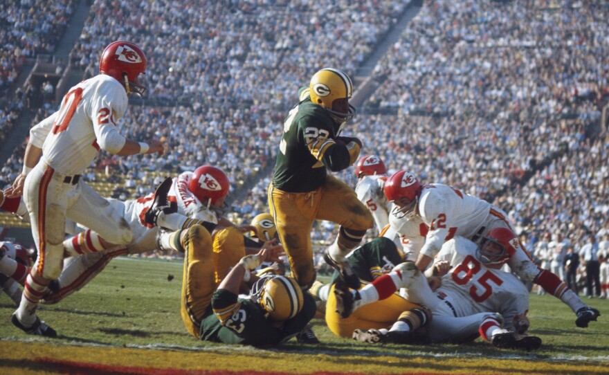 Green Bay Packers' Elijah Pitts #22 runs with the ball during Super Bowl I against the Kansas City Chiefs at Memorial Coliseum on Jan. 15, 1967 in Los Angeles.