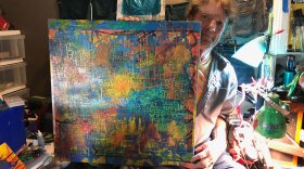 Ron Patterson shows off his artwork in his apartment in this photo taken Aug. 7, 2019. 