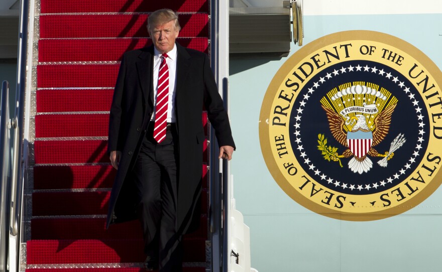 President Trump walks down the steps of Air Force One upon his arrival at Andrews Air Force Base, Md., on Feb. 6, returning from a weekend trip to Florida.