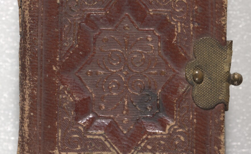 The pocket-sized photo album of Capt. William A. Prickitt contains four albumen prints and 14 tintypes of 17 African-American Union soldiers from the 25th Regiment, United States Colored Troops (USCT), Company G.