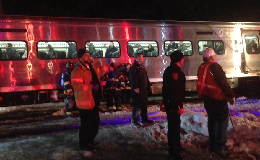 First responders work at the scene of a deadly accident involving a Metro-North commuter train Tuesday night in Valhalla, N.Y.