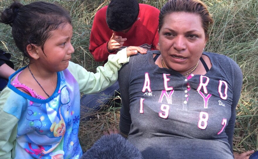 The Border Patrol apprehends a Salvadoran mother and her frightened daughter with a group of seven Central Americans down by the Rio Grande.