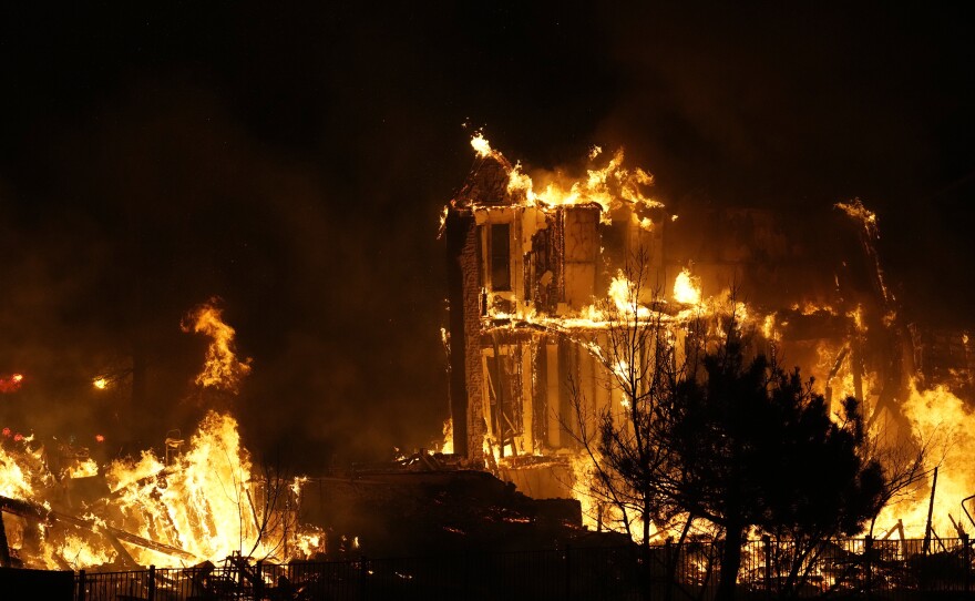 Dec. 30: Broomfield, Co. — Homes burn as a wildfire rips through a development near Rock Creek Village.
