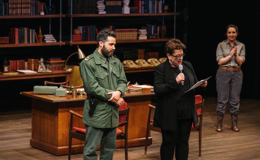Andhy Mendez as Fidel Castro takes the stage next to director Molly Smith for the opening night - and closing night - of the play <em>Celia and Fidel</em> at Arena Stage in Washington, D.C.