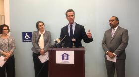 Gov.-elect Gavin Newsom speaks to reporters and immigration advocates at the San Ysidro Civic Center, Nov. 29, 2018.