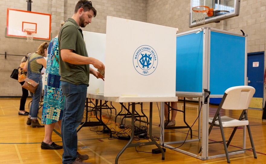 Voters cast their ballots at Reno High School for Nevada's statewide primaries on June 14.