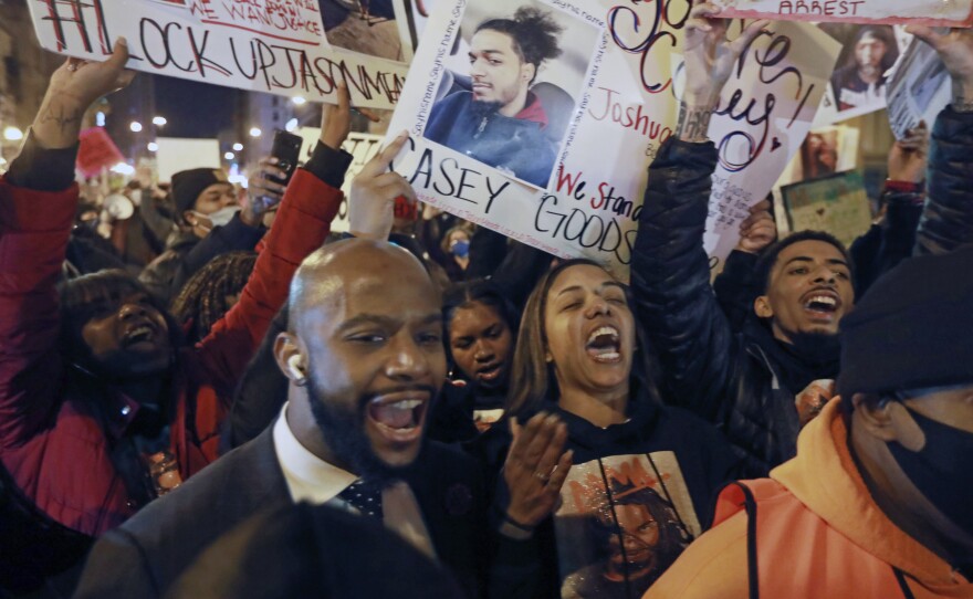 Tamala Payne (center) and attorney Sean Walton participate in a Dec. 11, 2020, protest of the shooting of her son, Casey Goodson Jr., by a Franklin County deputy sheriff in Columbus, Ohio.