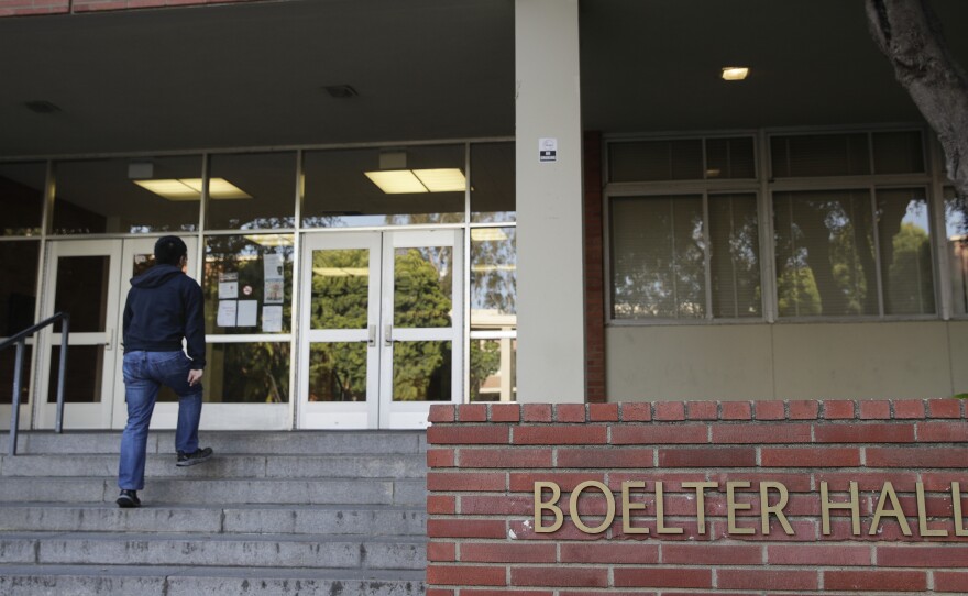 A student enters Boelter Hall at University of California, Los Angeles on Thursday. Hundreds of students and staff at two Los Angeles universities, including UCLA, have been placed under quarantine because they may have been exposed to measles and either have not been vaccinated or cannot verify that they are immune, officials said Thursday.