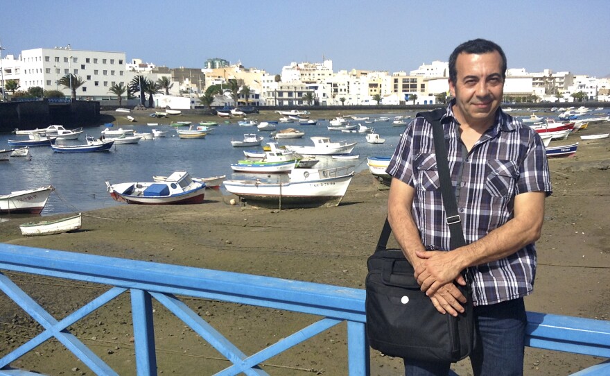 Ezequiel Navio, head of the local government's Office of Global Action, has been lobbying international environmental groups and tour operators to put pressure on Madrid, in hopes of reversing Repsol's work. Here, he is seen in front of a bay in Arrecife, the main town on Lanzarote.