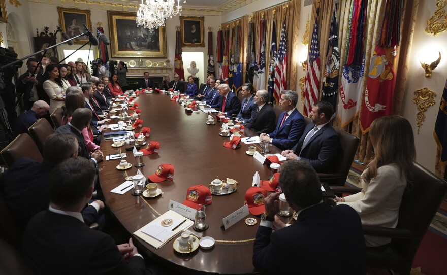 President Trump (center right) attends a Cabinet meeting in the Cabinet Room at the White House on Wednesday.