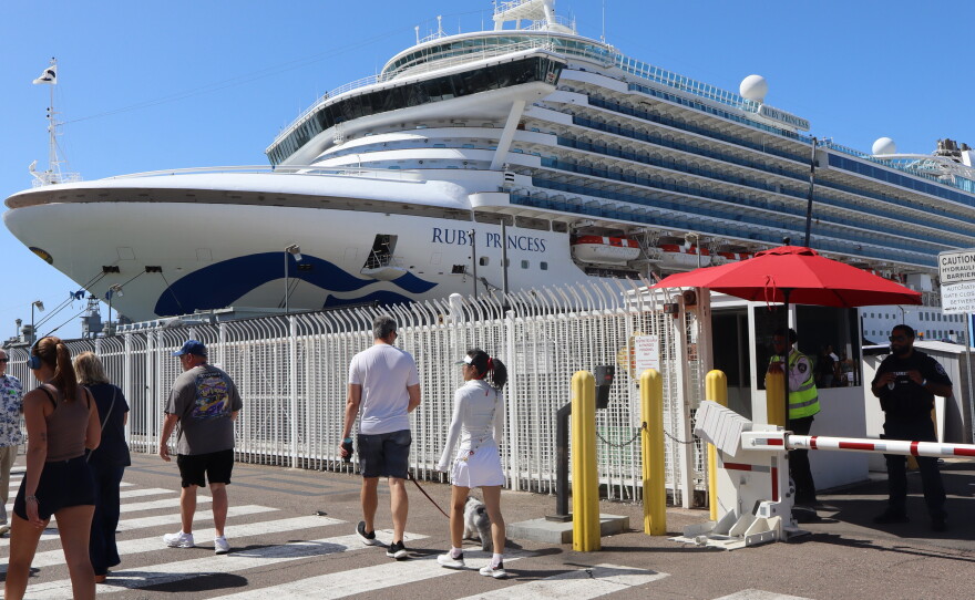 Pedestrians walk past the Ruby Princess docked at San Diego's Broadway Pier on Monday, Sept. 14, 2026.