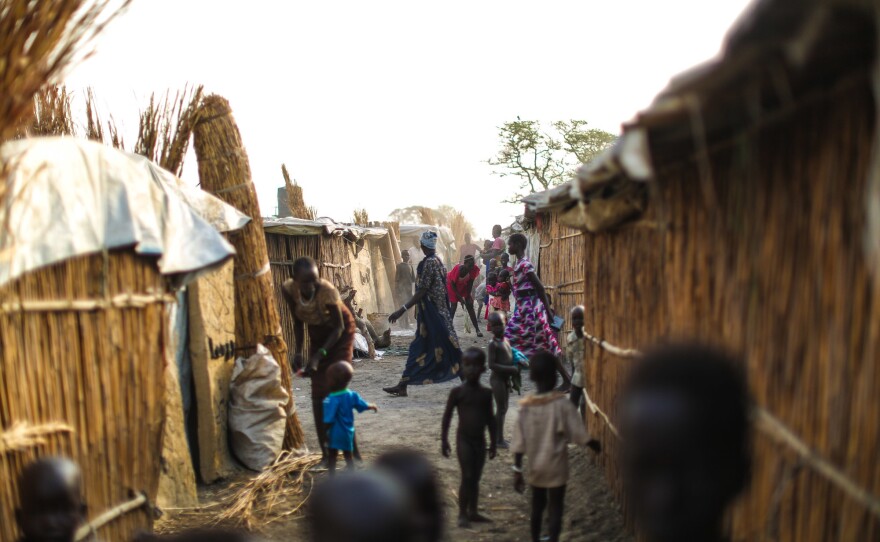 More than 120,000 people have fled their homes and now live in huts made from reeds and tarps in the crowded camp.