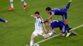 Argentina's Lionel Messi scores his team's second goal during the group F World Cup soccer match against Bosnia in Rio de Janeiro, June 15, 2014.
