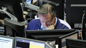A trader studies his computer screen in the VIX pit at the Chicago Board Options Exchange on April 27.