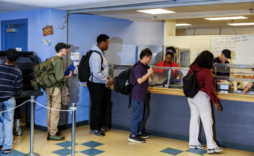 Westbrook High School students wait in line for lunch.