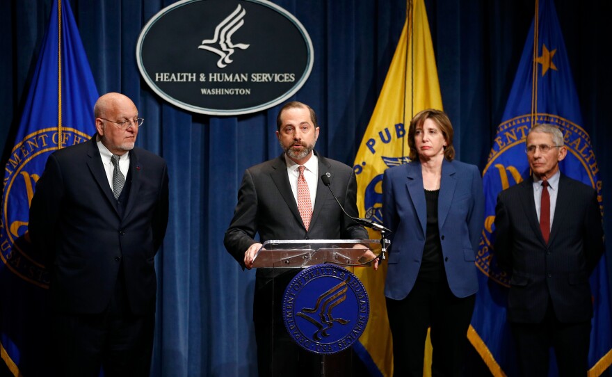 Health and Human Services Secretary Alex Azar led a news conference about the federal government's response to the outbreak of coronavirus. The conference included CDC's Robert Redfield, left, Nancy Messonnier and Anthony Fauci from the NIH.