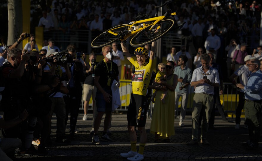 Vingegaard celebrates his win in the men's Tour de France.