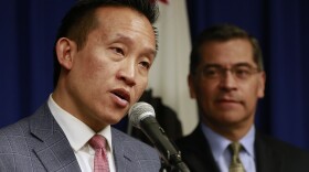 In this Feb. 13, 2018, file photo, Assemblyman David Chiu, D-San Francisco, left, speaks at a news conference in Sacramento, Calif. Chiu called on Gov. Gavin Newsom to appoint a member of the Asian and Pacific Islander community as California's next attorney general during a news conference on Wednesday, March 17, 2021.