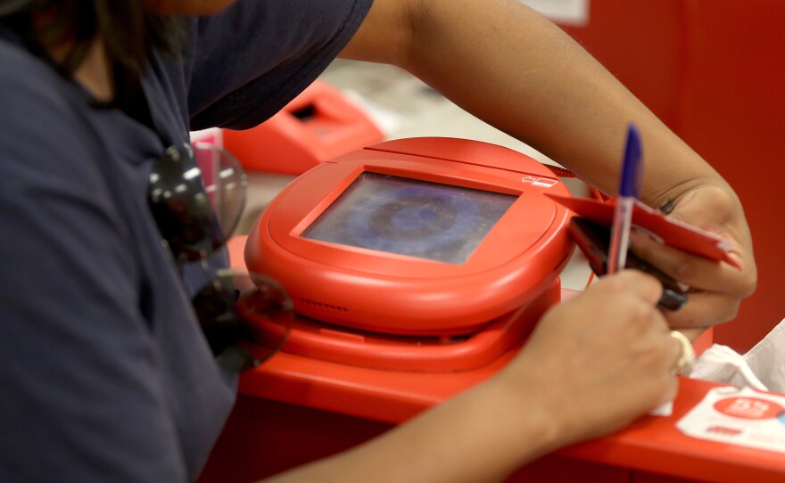 Hackers use credit card scanning machines as part of their sophisticated campaign to steal credit card information and sell it.