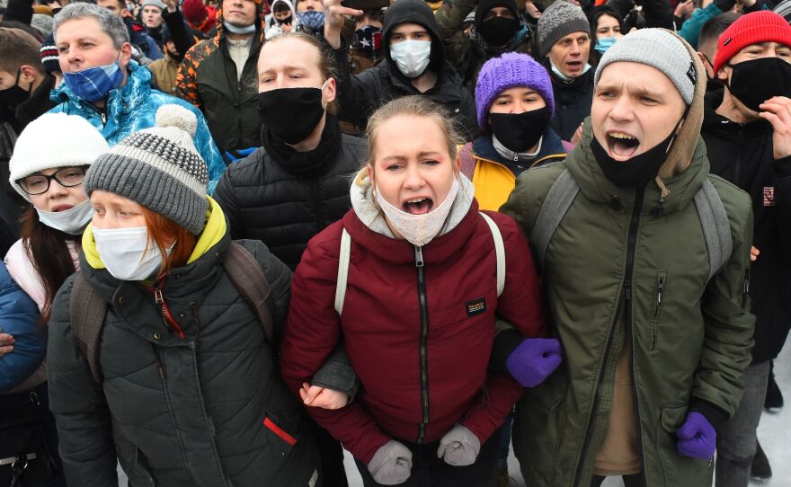 People attend a rally in support of jailed opposition leader Alexei Navalny in Saint Petersburg on Saturday.