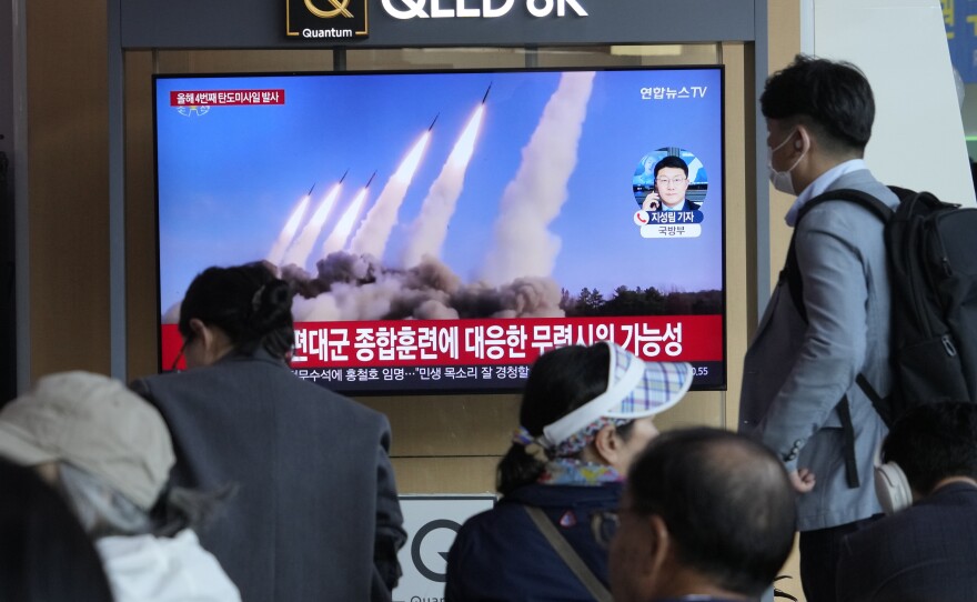 A TV screen shows a file image of North Korea's missiles launch during a news program at the Seoul Railway Station in Seoul, South Korea, Monday, April 22, 2024.