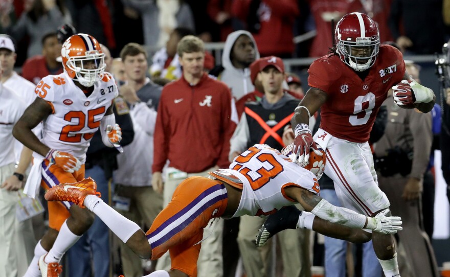 Sophomore running back Bo Scarbrough of the Alabama Crimson Tide rushes for a 37-yard touchdown Monday during the second quarter in the 2017 College Football Playoff National Championship Game against the Clemson Tigers in Tampa, Fla. Scarborough had two long touchdown runs, after getting two long scores against Washington in the semifinal game.