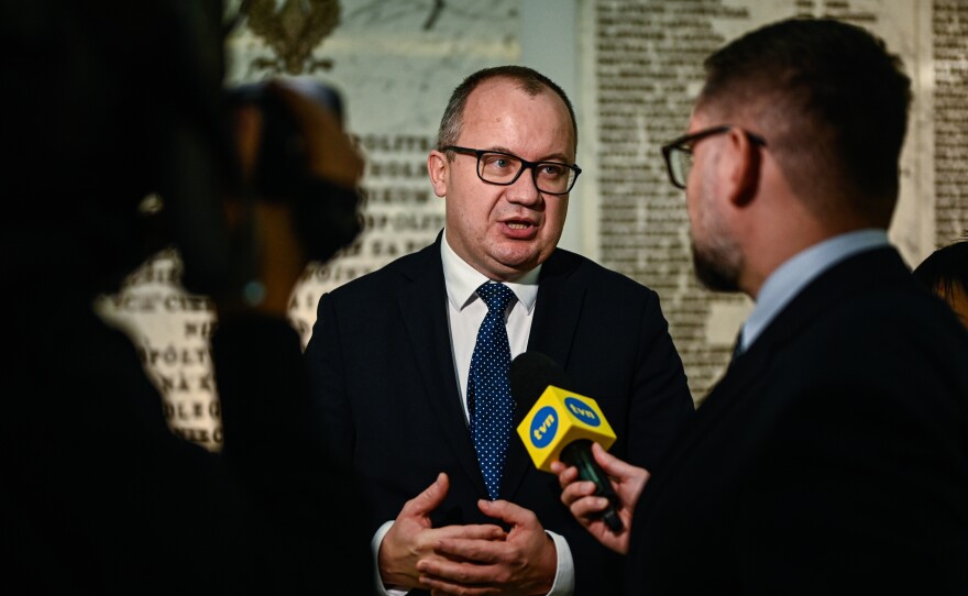 Poland's then soon-to-be minister of justice, Adam Bodnar, walks through the halls of parliament ahead of the vote of confidence on Donald Tusk's Cabinet during a session of parliament on Dec. 12, in Warsaw.