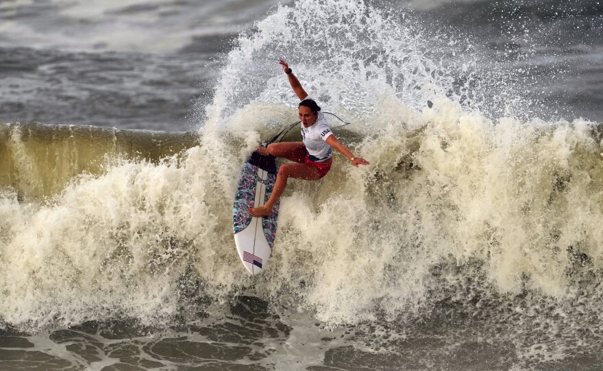 In this July 27, 2021, file photo, Carissa Moore, of the United States, preforms on the wave during the gold medal heat in the women's surfing competition at the 2020 Summer Olympics at Tsurigasaki beach in Ichinomiya, Japan.