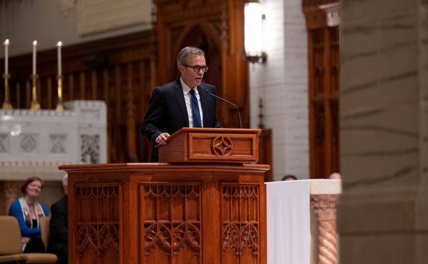 NESN sportscaster and anchor Tom Caron, a Lewiston native, speaks at the vigil.