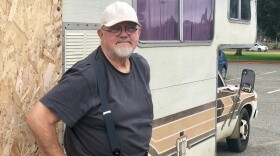 Mac Sperry stands next to his RV in Mission Bay, June 21, 2019.
