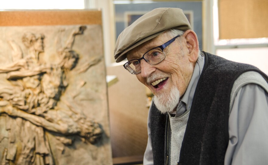 Eric Bransby, pictured above in his home in Colorado Springs, is still creating art at 98. "I try to make each mural a project that will somehow expand my abilities a little bit more," he says.