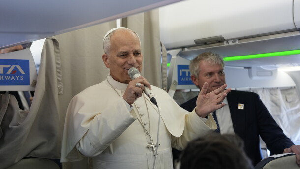 Pope Leo XIV talks to journalists aboard the papal flight from Rome to Madrid on June.