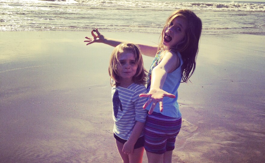 Sisters Jackie Carter Christian (left) and Chloe Marie Christian at the beach.