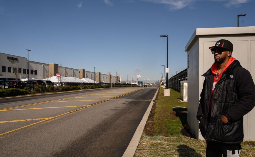 Amazon Labor Union president Chris Smalls waits as workers cast their votes over whether or not to unionize in an election held outside an Amazon warehouse in Staten Island on March 25, 2022.