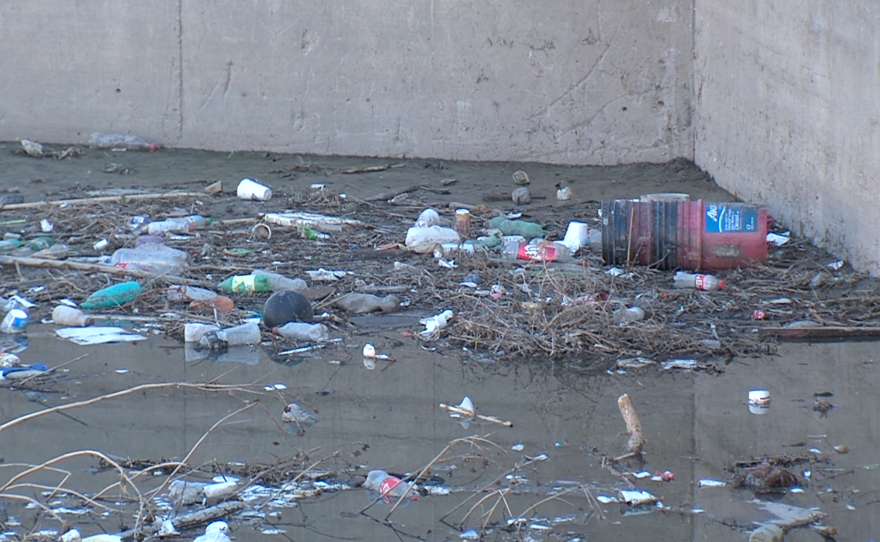 Trash fills up a settling tank in Tijuana's Cañon de la Pedrera, Dec. 2, 2015.