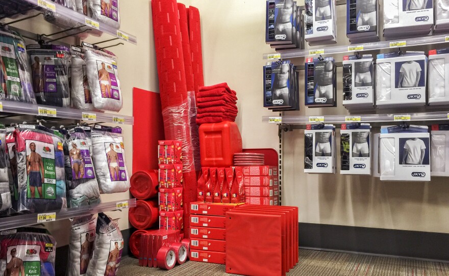 Art amid the underwear: Brown chooses a color, "shops" the store to find items and then sets them up into impromptu sculptures in the store.
