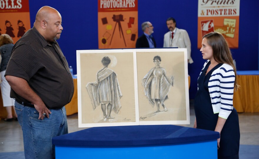 Meredith Hilferty (right) appraises John Biggers drawings, ca. 1960 for $12,000 to $18,000 in Baton Rouge, La.