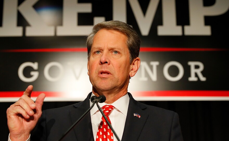 Republican gubernatorial candidate Brian Kemp has declared victory in a closely-fought race with Democrat Stacey Abrams that included accusations he abused his office to win the election.