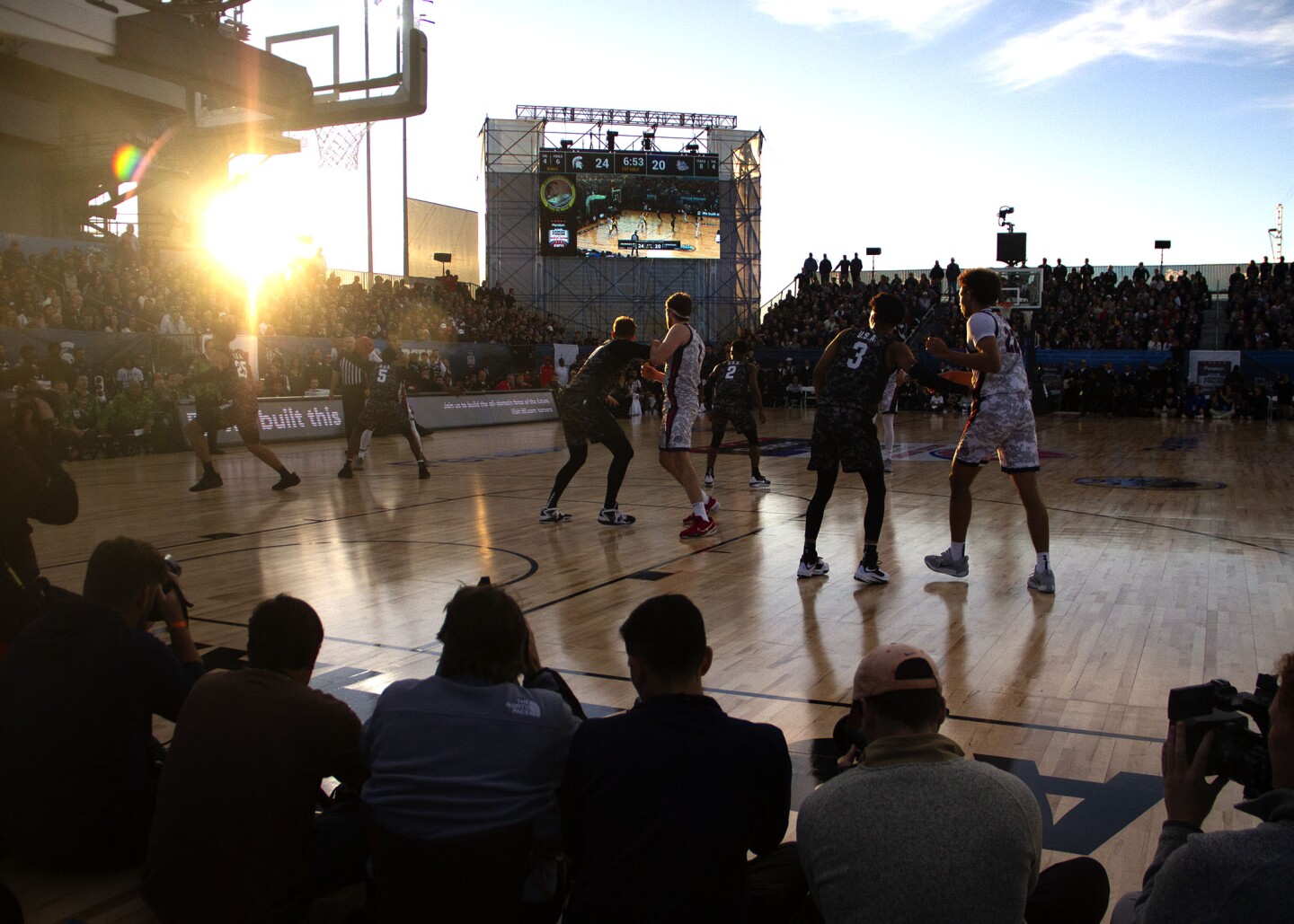 The sun sets behind the court as MSU and Gonzaga face off in the Armed Forces Classic on board USS Abraham Lincoln in San Diego on Nov. 11, 2022.