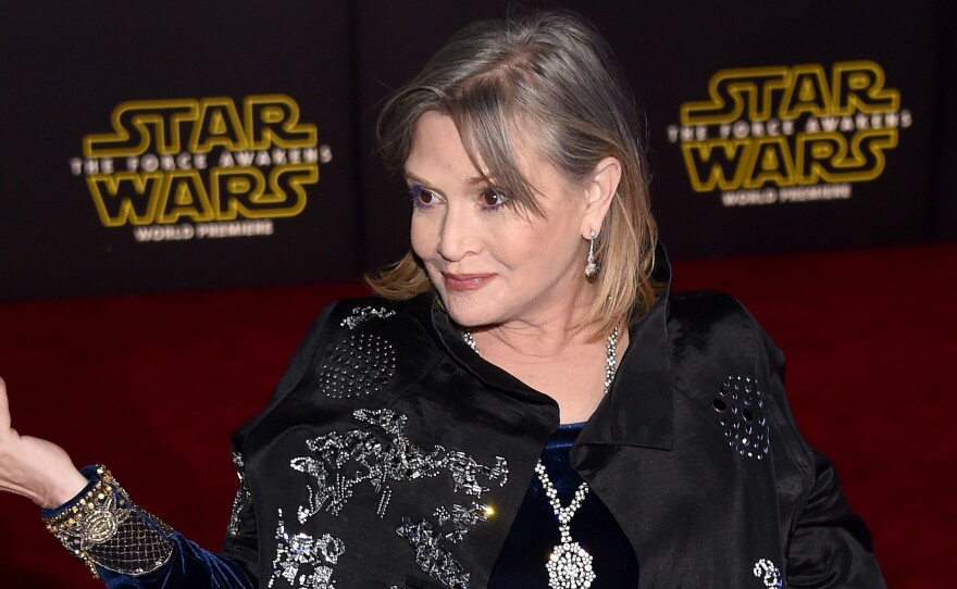Actress Carrie Fisher attends the premiere of <em>Star Wars: The Force Awakens</em> at the Dolby Theatre in Hollywood on Dec. 14, 2015. The late actress is being honored with a star on the Hollywood Walk of Fame on Thursday.