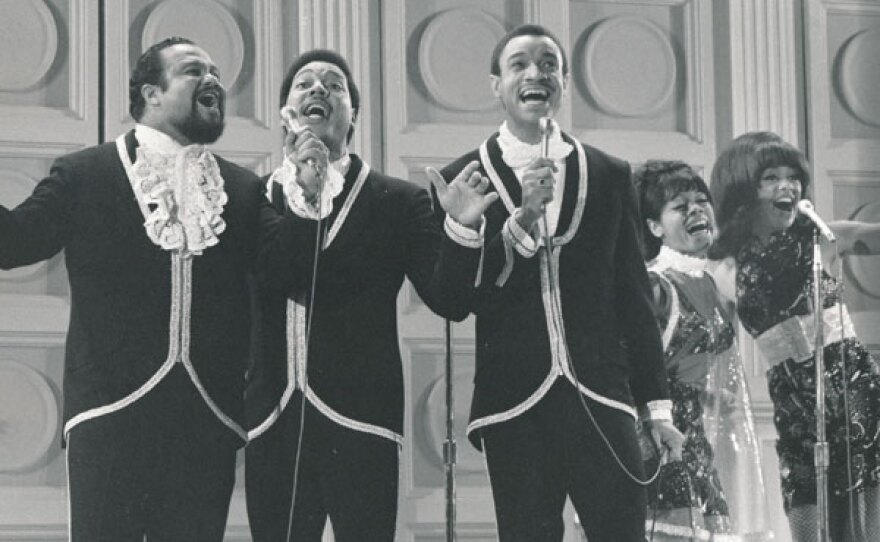 Pop-soul group the 5th Dimension performs their million-selling smash "Up, Up and Away."