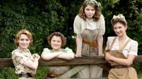 Annie Barratt played by Christine Bottomley; Joyce Fisher played by Becci Gemmell; Bea Holloway played by Jo Woodcock; Nancy Morrell played by Summer Strallen from the television series LAND GIRLS.
