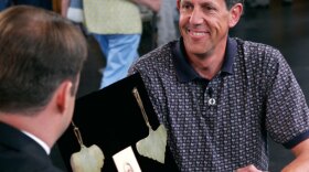 Appraiser Thomas Lecky of Christie's corrals a set of frontier treasures. These breastplate decorations, known as gorgets, were worn by two of the Sioux nation's most powerful chiefs in the 1870s. Together with an original copy of the first book ever printed in Wyoming - an 1866 dictionary of the Sioux language - this collection could round up $100,000 to $150,000 at auction.