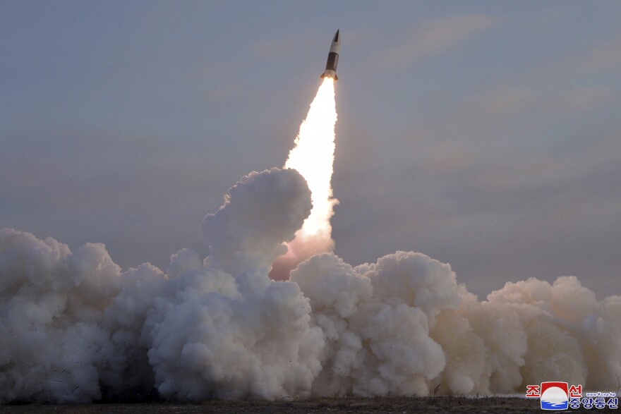 This photo provided by the North Korean government, shows what it says a test-fire of tactical guided missile in North Korea Monday, Jan. 17, 2022.